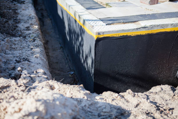 Professional Basement Waterproofing technician working in Waldron, IN